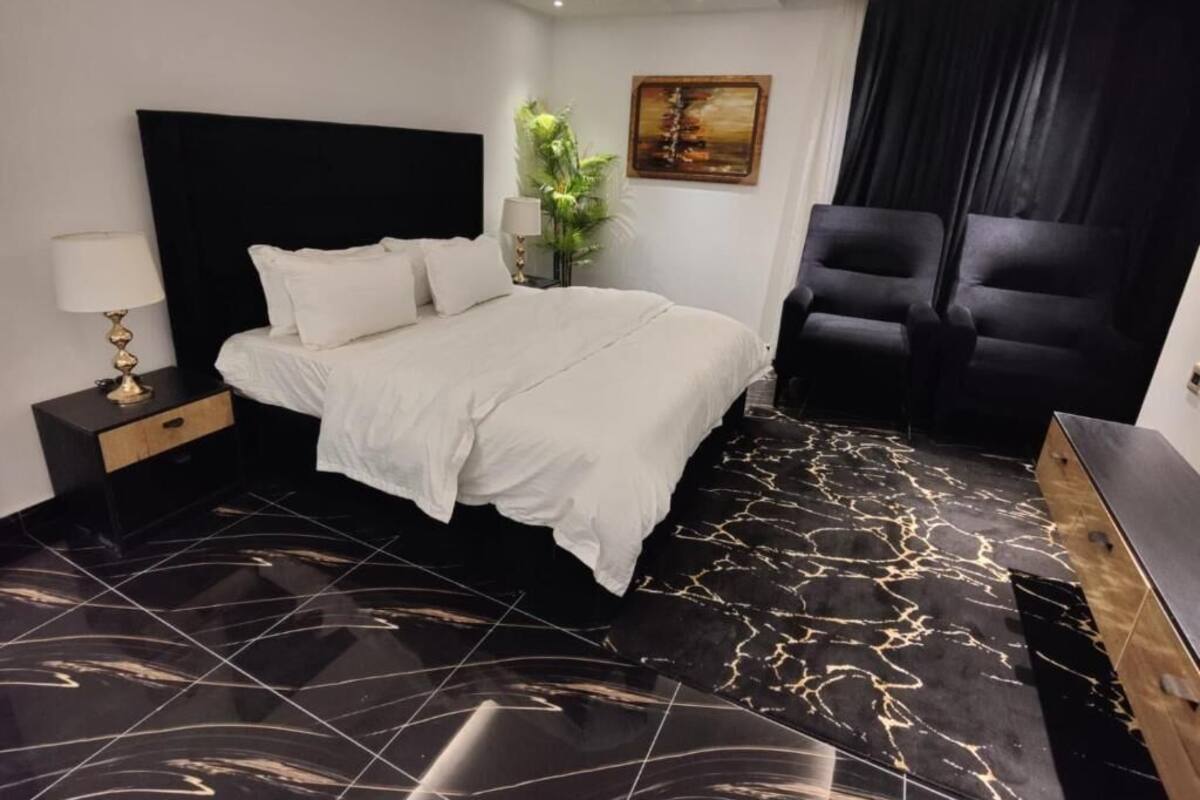Apartment, 2 Bedrooms, Balcony, City View | 1 bedroom, blackout drapes, soundproofing, iron/ironing board