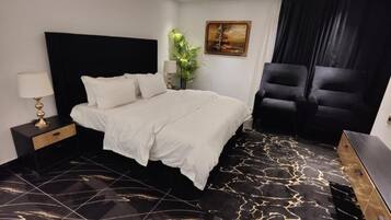Apartemen, 2 kamar tidur, balkon, pemandangan kota | 1 kamar tidur, tirai kedap cahaya, kedap suara, dan setrika/meja setrika