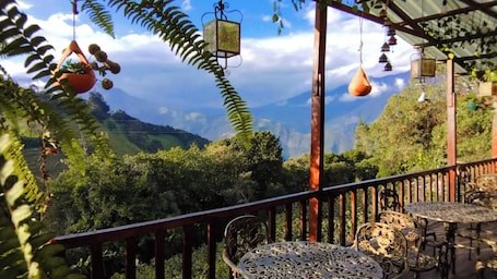 Terrace/patio. Las Orquideas Runtun Lodge