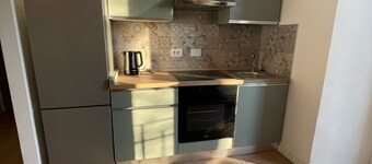 House in the center near the port and station