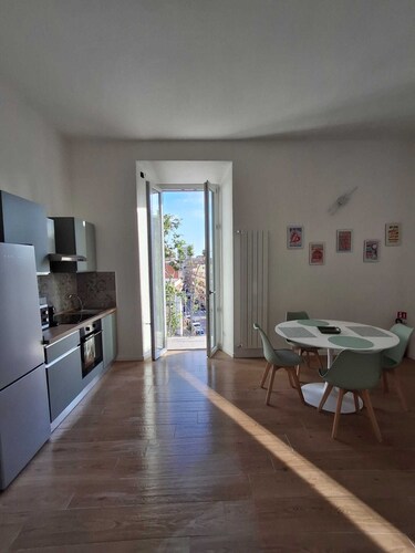 House in the center near the port and station