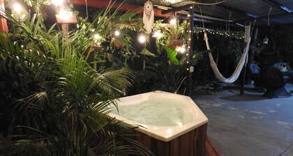 Charming 2-bedroom beach house in CR's only Blue Zone with AC, WiFi and Jacuzzi.