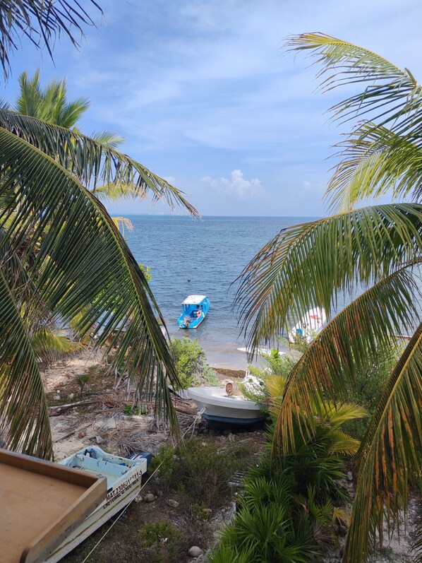 On the beach, sun-loungers, beach towels