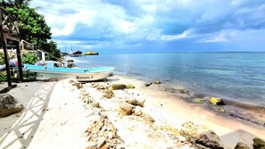 On the beach, sun loungers, beach towels