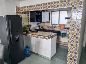 Fridge, stovetop, coffee/tea maker, toaster