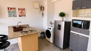 Standard Apartment, City View | Private kitchen | Full-size fridge, microwave, stovetop, rice cooker - Cold AC fast Wi-Fi great location  (Medellín)