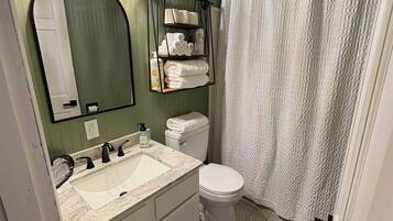 Hair dryer, towels, soap, toilet paper