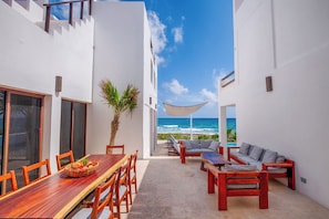 Outdoor dining - Award Winning and Modern Oceanfront Villa in Akumal, Mexico (Akumal)