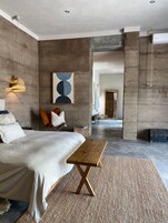 Deluxe Suite, Garden View | 1 bedroom, down comforters, minibar, individually decorated