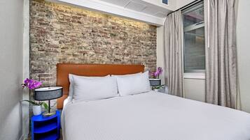 1 habitación, tabla de planchar con plancha, wifi gratis y ropa de cama