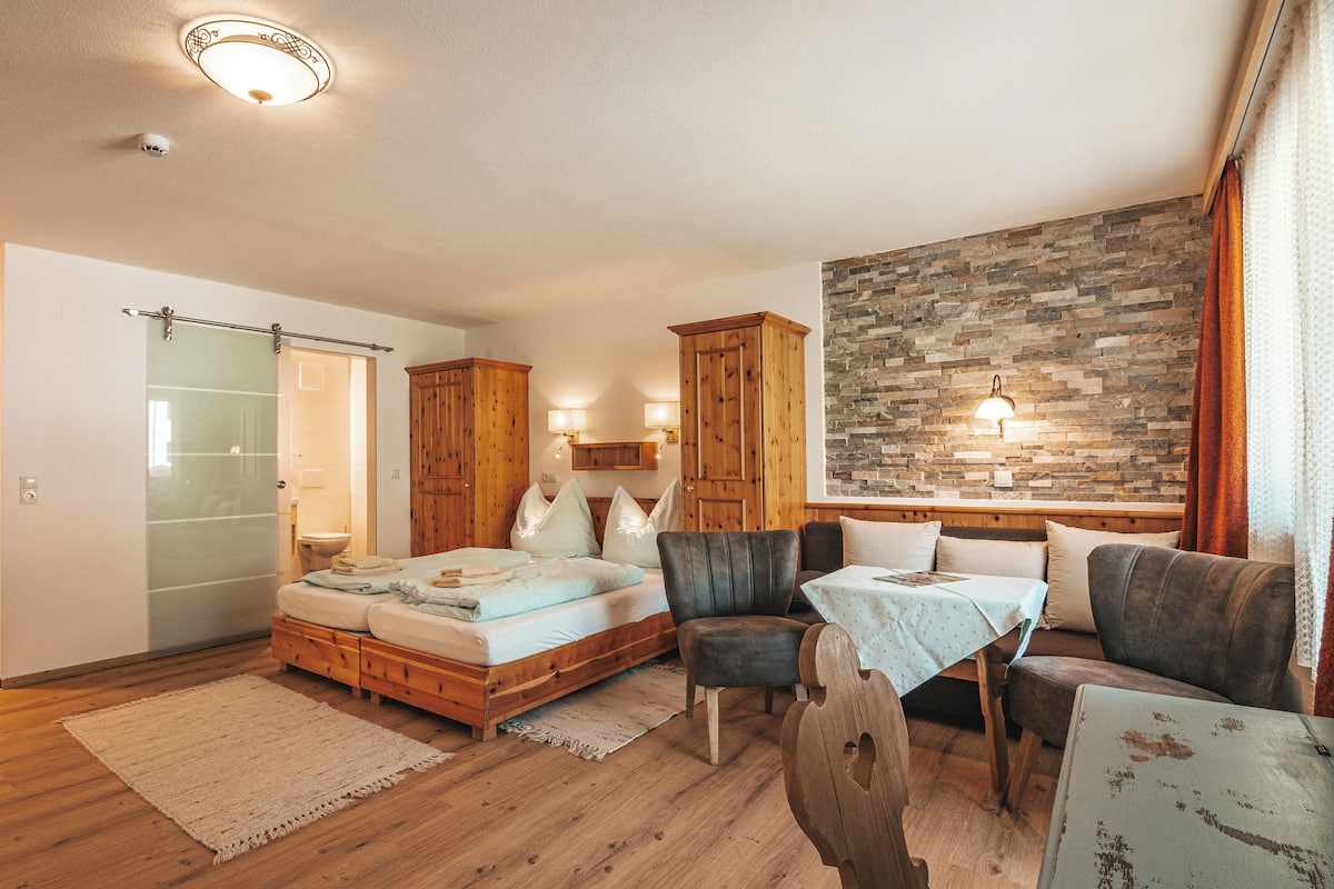Deluxe Quadruple Room, Balcony, Mountain View | In-room safe, free WiFi, bed sheets