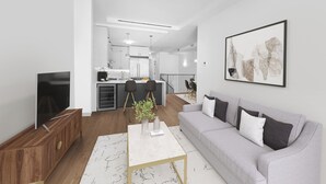 Una sala de estar moderna con un sofá gris, un mueble bajo de televisión de madera y una mesa de centro.