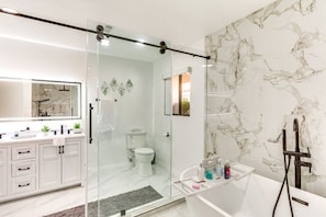 Shower, hair dryer, towels, soap