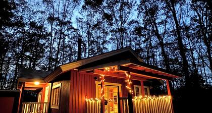 Enjoy a private sauna and authentic charcoal BBQ in the quiet forest of Kita-Karuizawa at the bright red Finland House.