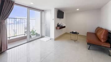 Panoramic Studio | Living area | 40-inch Smart TV with digital channels