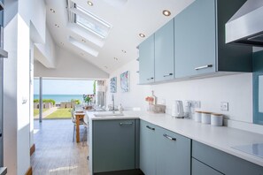 Fridge, microwave, dishwasher, dining tables