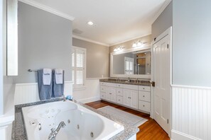 Shower, jetted tub, hair dryer, shampoo