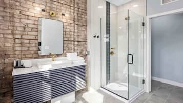 Shower, hair dryer, towels, shampoo