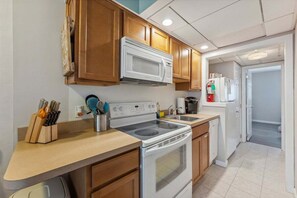 Fridge, oven, dishwasher, coffee/tea maker