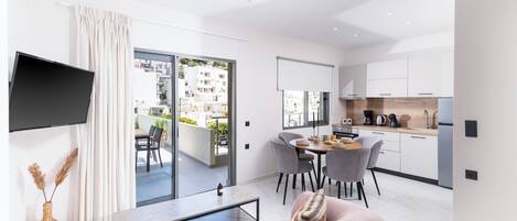 Penthouse, Balcony, Partial Sea View | Living area | TV