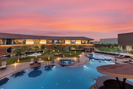 Outdoor pool. The Aaureum Resort & International Convention Centre