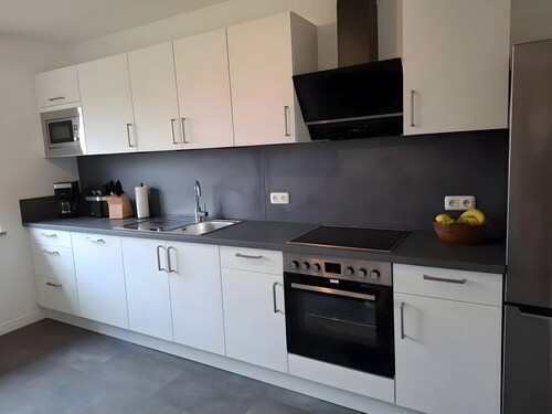 Ferienhaus 'Timeout' mit privater Terrasse, Garten am Fleet(Kanal) und W-Lan