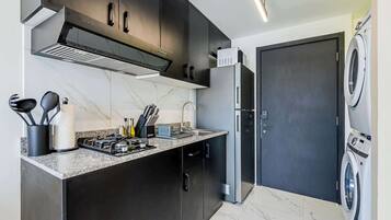 Fridge, microwave, stovetop, coffee/tea maker