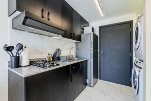 Fridge, microwave, stovetop, coffee/tea maker