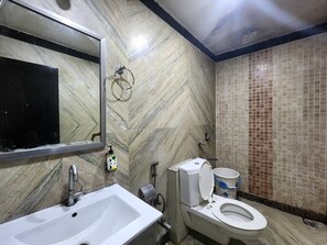Shower, towels, soap, shampoo