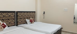 Family Quadruple Room | Desk, laptop workspace, soundproofing, free WiFi - Sacred Stay (Guwahati)