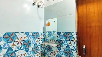 Shower, free toiletries, slippers, soap