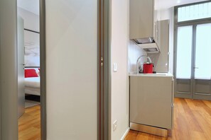 Apartamento conforto, vista para a cidade | Área de estar | TV LED 43 polegadas com canais digitais