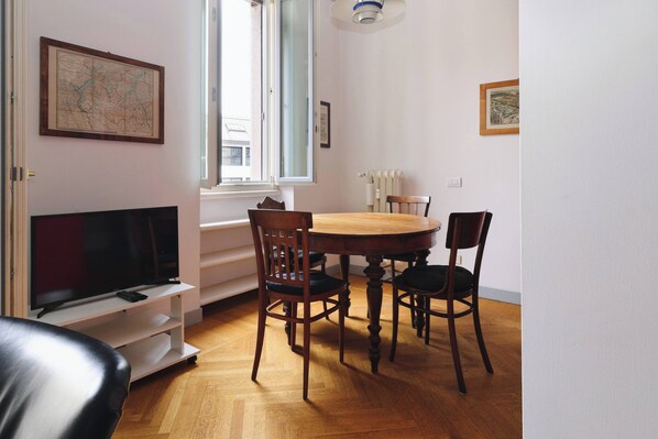 Comfort Apartment, City View | Living area | 43-inch Smart TV with digital channels