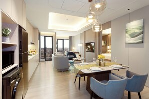 1 Bedroom Premier Suite | Living area | 55-inch Smart TV with digital channels - Somerset Queen City Semarang (Semarang)