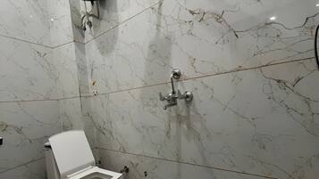 Deluxe Double Room | Bathroom | Shower, towels, soap