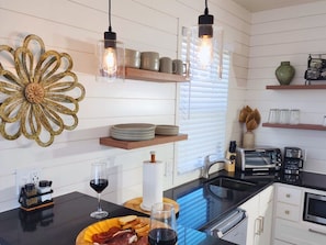 Fridge, microwave, dishwasher, coffee/tea maker