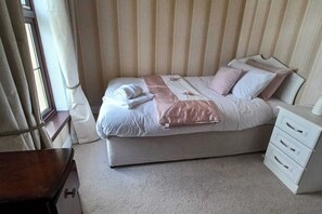 Casa | 3 dormitorios, tabla de planchar con plancha, wifi gratis y ropa de cama