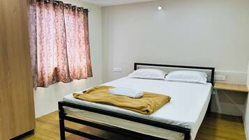 Desk, rollaway beds, free WiFi, bed sheets