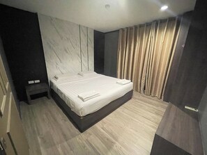 Suite, 1 Bedroom | Desk, free WiFi, bed sheets - Carpediem Hotel (Rayong)
