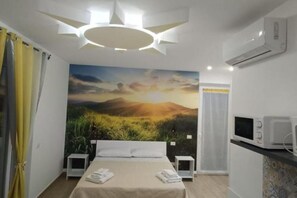Planxa i posts de planxar, wifi i roba de llit 