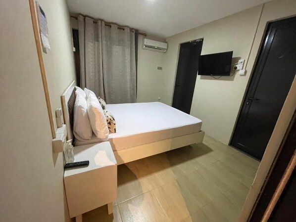 1 habitación, tabla de planchar con plancha, wifi y ropa de cama 