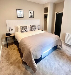 2 bedrooms, desk, laptop workspace, iron/ironing board