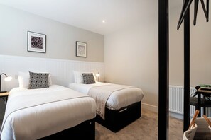 2 bedrooms, desk, laptop workspace, iron/ironing board