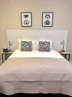 2 bedrooms, desk, laptop workspace, iron/ironing board