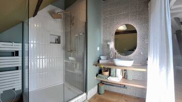 Shower, hair dryer, towels, soap