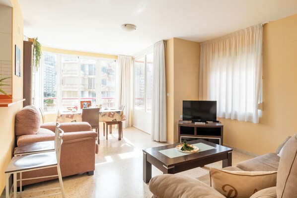 Standard Apartment, Multiple Bedrooms (Benidorm Levante Beach 9B) | Living area | 21-inch flat-screen TV with cable channels - Benidorm Levante Beach Apartments (Benidorm)