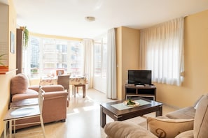 Standard Apartment, 1 Bedroom (Benidorm Levante Beach 9B) | Living area | 21-inch flat-screen TV with cable channels