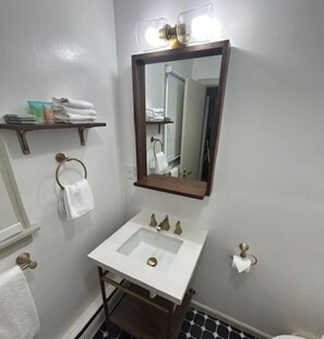 Hair dryer, towels, soap, toilet paper