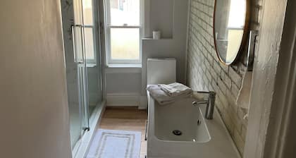 Fully furnished apartment in quiet century home available for short term rental.