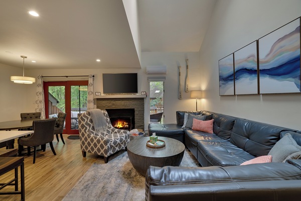 Cozy living room with electric fireplace.